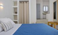 Postel nebo postele na pokoji v ubytování Aster house Agios Sostis
