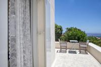 Balkón alebo terasa v ubytovaní Violet house Agios Sostis