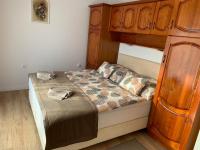Łóżko lub łóżka w pokoju w obiekcie Dodi Apartman
