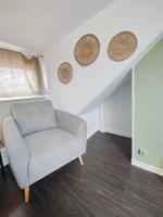 Część wypoczynkowa w obiekcie Appartement Le Baroque en duplex