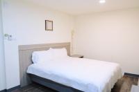 Yoai Mountain Roam Hotelにあるベッド