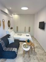 TV a/nebo společenská místnost v ubytování Popis Sea View Apartments