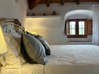 Postel nebo postele na pokoji v ubytování Las casillas de la Villa: SOLEÁ