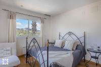 Posteľ alebo postele v izbe v ubytovaní Villa Wagner by Abahana Villas