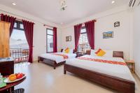 Quynh Chau Homestay Hội Anにあるベッド