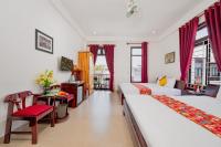 Quynh Chau Homestay Hội Anにあるベッド