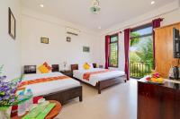 Quynh Chau Homestay Hội Anにあるベッド