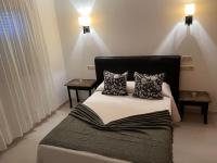 Postel nebo postele na pokoji v ubytování Hotel Ronsel