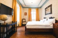 Postel nebo postele na pokoji v ubytování Hotel Latrán