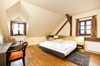 Postel nebo postele na pokoji v ubytování Hotel Latrán