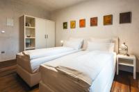 Postel nebo postele na pokoji v ubytování Hotel Latrán