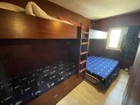 Łóżko lub łóżka w pokoju w obiekcie Appartement 3 pièces avec clim, wifi, parking Saint-Cyprien Plage - FR-1-106-62
