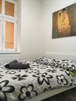 Postel nebo postele na pokoji v ubytování Vintage Apartment Ostrava center city
