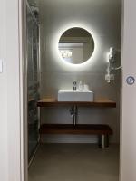 a bathroom with a sink and a mirror at Hotel Genova Liberty in Genoa