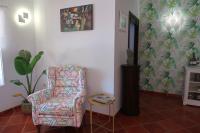 Televízia a/alebo spoločenská miestnosť v ubytovaní Hotel Malaga Picasso