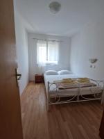 Posteľ alebo postele v izbe v ubytovaní Apartments with parking spaces Lopar, Rab - 16680