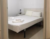 Postel nebo postele na pokoji v ubytování Cozy 2 Bedroom Apartment in Barrio de Salamanca