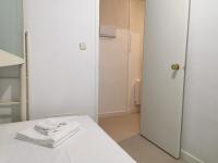 Postel nebo postele na pokoji v ubytování Cozy 2 Bedroom Apartment in Barrio de Salamanca
