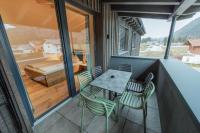 Balkon lub taras w obiekcie Ferienwohnungen Karlingerhof am See