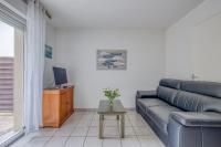 Część wypoczynkowa w obiekcie Maison de ville Domaine des sables