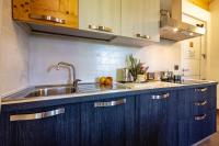 A kitchen or kitchenette at Case Appartamenti Vacanze Da Cien