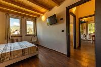 A bed or beds in a room at Case Appartamenti Vacanze Da Cien