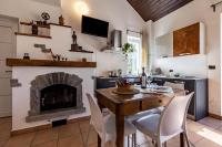 A kitchen or kitchenette at Case Appartamenti Vacanze Da Cien