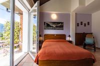 A bed or beds in a room at Case Appartamenti Vacanze Da Cien