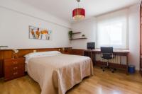 A bed or beds in a room at PR La Paz