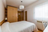 A bed or beds in a room at PR La Paz