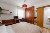A bed or beds in a room at PR La Paz