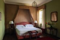Łóżko lub łóżka w pokoju w obiekcie Hotel Certosa Di Maggiano