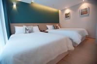 Sienna Ambassador Residenceにあるベッド