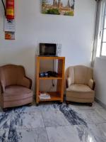 TV a/nebo společenská místnost v ubytování Pensión Glorioso II