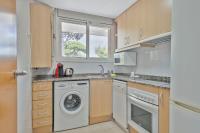 Kuchyň nebo kuchyňský kout v ubytování Apartamentos Velor