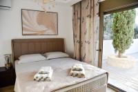 Posteľ alebo postele v izbe v ubytovaní Sea View Private Pool Villa Katrin