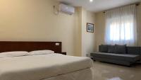 Postel nebo postele na pokoji v ubytování Sun Galicia Hotel y Apartamentos