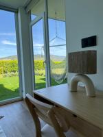 TV a/nebo společenská místnost v ubytování Porto Cabana by Miramar Stays