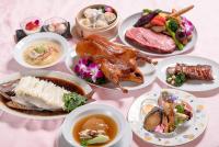 a table topped with plates of food and bowls of food at Hotel Global View Tsuchiura in Tsuchiura