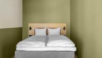 Postel nebo postele na pokoji v ubytování Comfort Hotel Trondheim