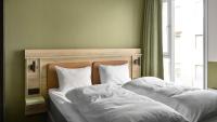 Postel nebo postele na pokoji v ubytování Comfort Hotel Trondheim