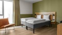 Postel nebo postele na pokoji v ubytování Comfort Hotel Trondheim