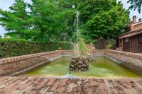 Vonkajšia záhrada v ubytovaní Italian Experience-Villa Rosso Corbezzolo