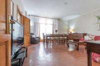 Televízia a/alebo spoločenská miestnosť v ubytovaní Italian Experience-Villa Rosso Corbezzolo
