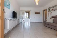 A television and/or entertainment centre at Italian Experience-CasAmare