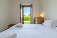 A bed or beds in a room at Italian Experience-CasAmare