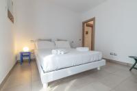A bed or beds in a room at Italian Experience-CasAmare