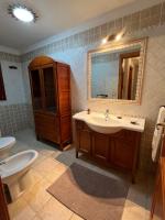 A bathroom at VILLA VITTORIA with PRIVATE HEATED SWIMMING POOL COMPLETE WITH HIDROMASSAGE FOR EXCLUSIVE USE , SEA VIEW, 150 METERS FROM THE BEACH