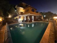 The swimming pool at or close to VILLA VITTORIA with PRIVATE HEATED SWIMMING POOL COMPLETE WITH HIDROMASSAGE FOR EXCLUSIVE USE , SEA VIEW, 150 METERS FROM THE BEACH