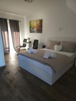 Posteľ alebo postele v izbe v ubytovaní Guest House Mačić